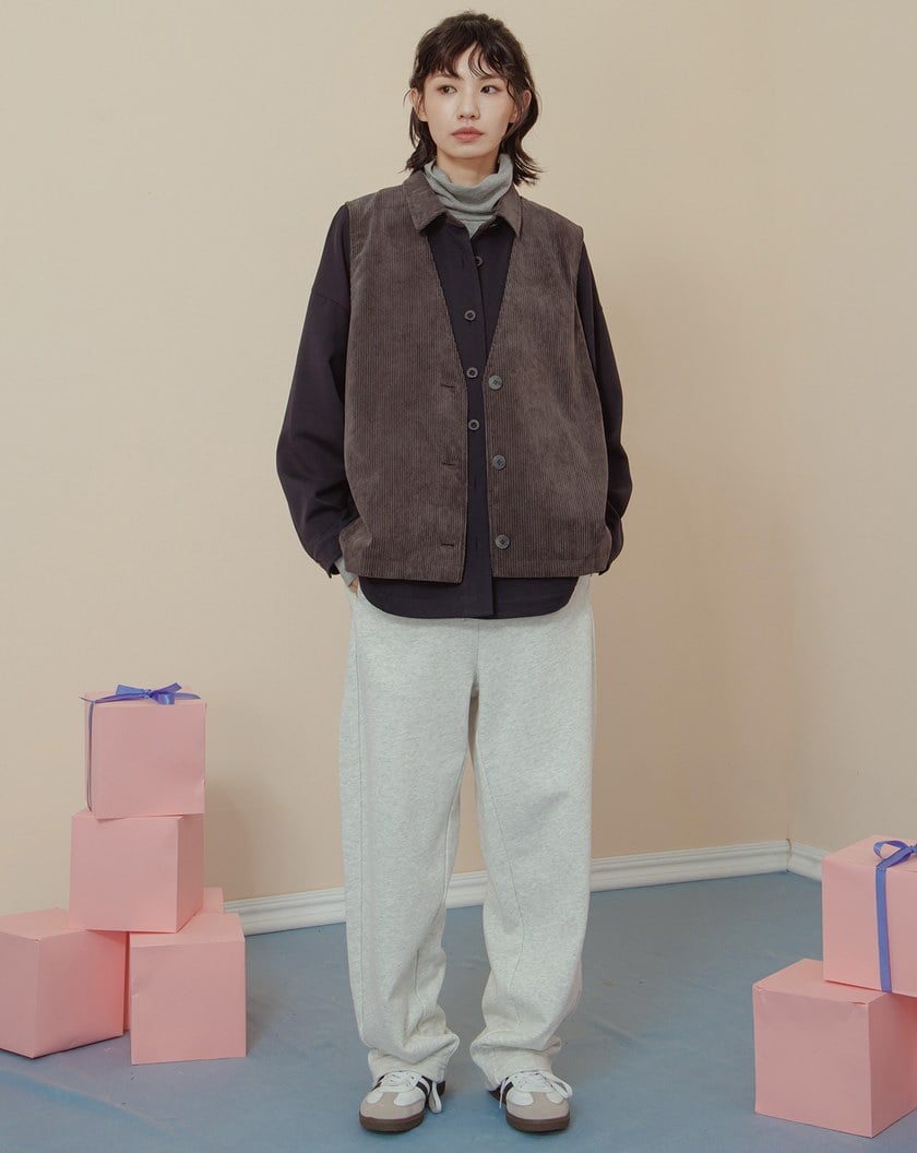 顯瘦遮臀異材質拼接開襟背心(兩色)