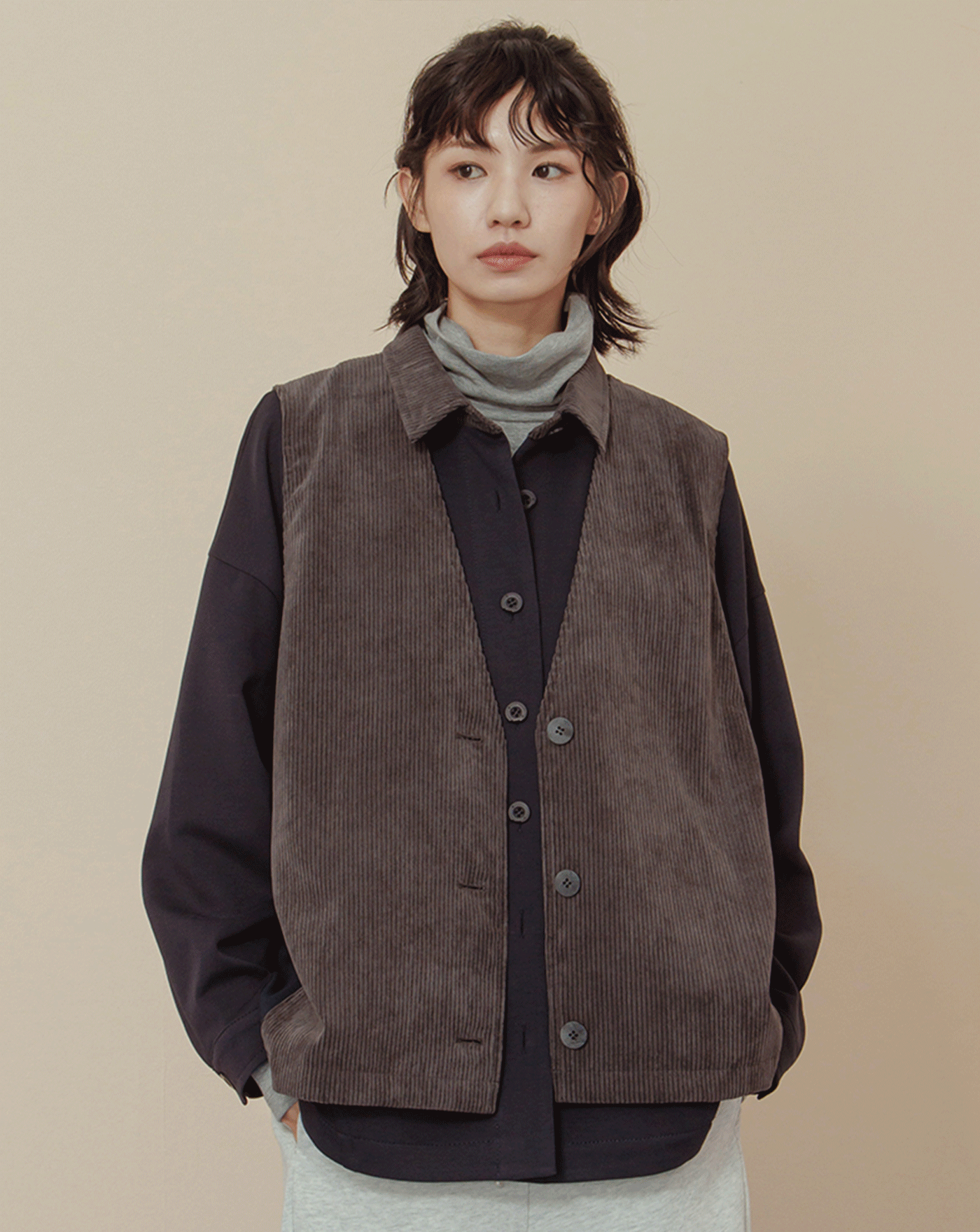 顯瘦遮臀異材質拼接開襟背心(兩色)