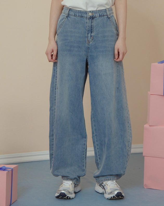 立體刷色顯瘦剪接彎刀牛仔褲