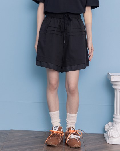 顯瘦異材質假兩層抽繩五分褲(兩色)