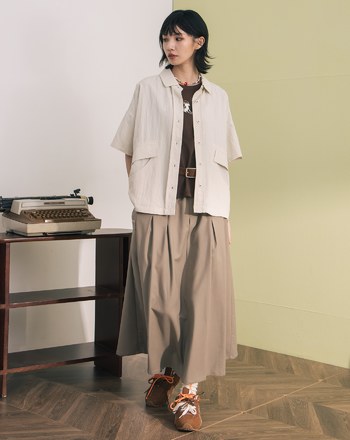 ➤抗皺釦洞造型口袋打褶傘裙(兩色)