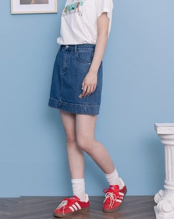 顯瘦斜邊剪裁皮標A字牛仔短裙