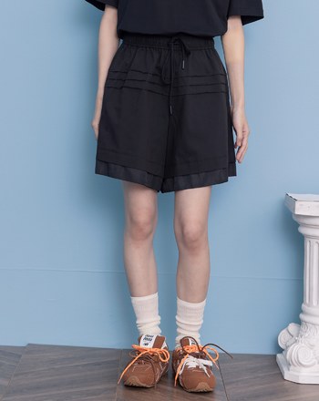 顯瘦異材質假兩層抽繩五分褲(兩色)