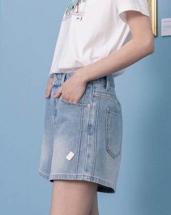 顯瘦剪接皮標牛仔短褲