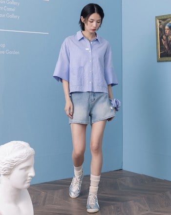 顯瘦剪接皮標牛仔短褲