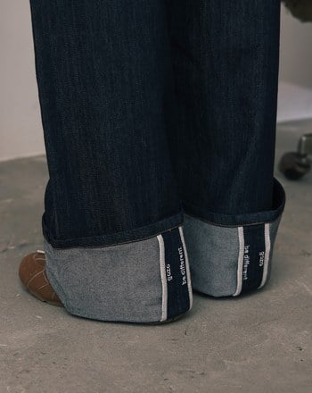 A｜大反折品牌標語繡花天絲水洗牛仔寬褲