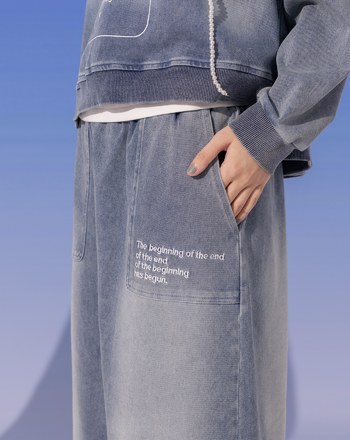 水洗牛仔口袋造型標語繡花長裙